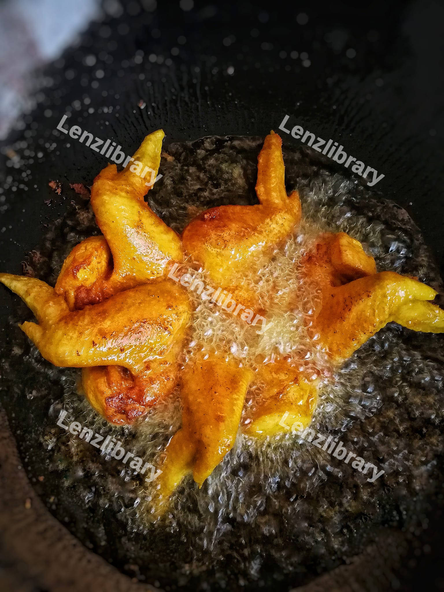 Fried chicken in the boiling oil